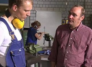 Foto: Gespräch Ausbilder mit Auszubildendem